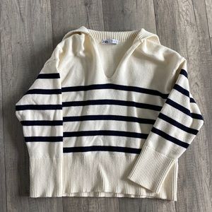 Kitted white and blue sweater